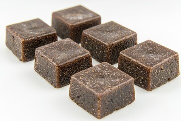 Square chocolate brownies with a rich and fudgy texture, perfect for dessert lovers, homemade, indulgent, satisfying, and delicious, served on a white plate, a chocolatey delight