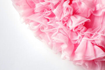 fluffy pink skirt with ruffles close-up. Elegant festive background. Sewing clothes with your own...