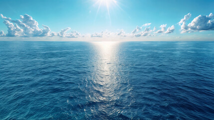 Fototapeta premium Aerial view of a turquoise, calm and crystal clear ocean. Blue water background in summertime