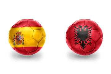football balls with national flags of spain and albania ,soccer teams. on the white background.
