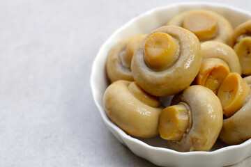 Champignon mushrooms in brine. Canned champignon mushrooms whole
