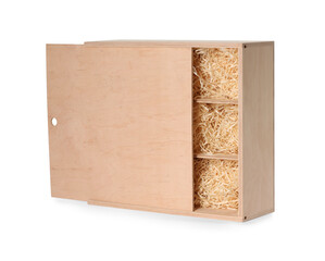 Open wooden wine box with straw isolated on white