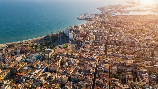 cozy streets and ancient architecture of coastal town Tarragona, Spain, aerial drone view