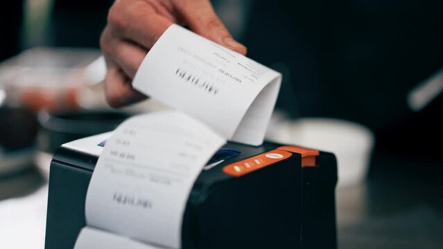 close-up in a professional kitchen receipt preparation for showing order to chef