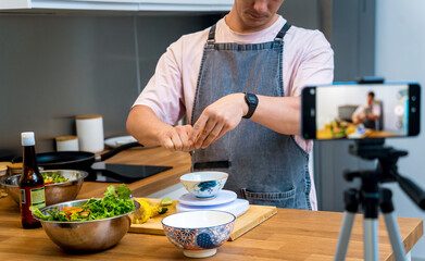 The chef is broadcasting live from workshop how to prepare a spicy glass noodle salad