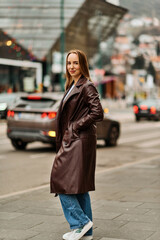 Fototapeta premium A Casual Girl Poses with Confidence and Style on Urban Streets