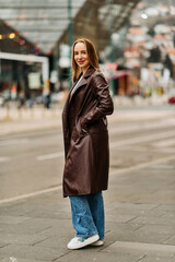 Obraz premium A Casual Girl Poses with Confidence and Style on Urban Streets