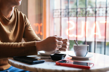 Unrecognizable people at a cafeteria table