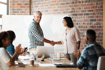 Man, woman and handshake for welcome to startup with smile, support and introduction to team on office. Business people, leader and shaking hands with new employee with deal, agreement and applause