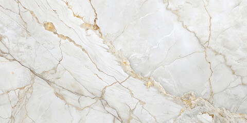 A detailed close-up of a white marble surface with intricate veining. The marble has a smooth, polished finish, showcasing its natural elegance and luxurious appeal