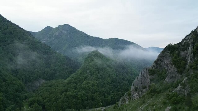 Majestic Mountains Covered With Tropical Forest Near Lepsa, Vrancea County, Romania. Aerial Drone Shot