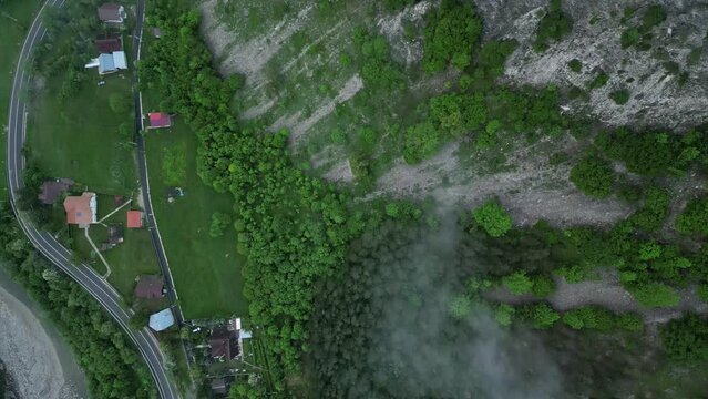 Sheer Rocky Mountains Near Lepsa Rural Village In Vrancea County, Romania. Aerial Shot