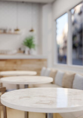 A space for displaying products on a luxury white marble round table in a contemporary coffee shop.