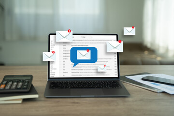 man reading e-mail on smartphone email inbox and email with laptop on internet information from...