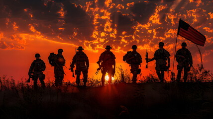 Fototapeta premium Silhouette of a group of soldiers with the american flag and guns