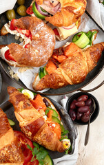 Large selection of breakfast food on a table.
