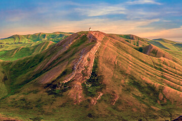 Magnificent landscape of the Karamuruntau ridge in the rays of the setting sun