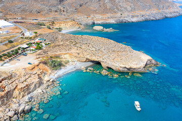 Famous sandy beach of Kalo Nero and Staousa near Makris Gialos, Crete, Greece.
