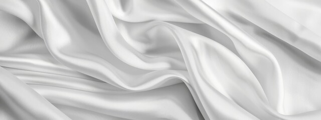 Obraz premium Luxurious White Silk Fabric Folded Background for Posters, Banners, and Cover Designs - HD Wallpaper with Smooth Drapery