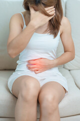 woman having abdomen ache due to Stomach pain, digestion with constipation or Diarrhea from food...