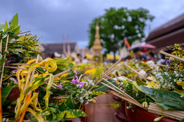 People worshiping and offering flowers attended a ceremony to worship the city pillar (Inthakin...