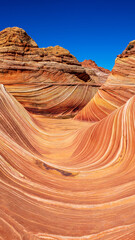 The Wave is a sandstone rock formation located in Arizona, US, near its northern border with Utah. The formation is situated on the slopes of the Coyote Buttes in the Paria Canyon-Vermilion Cliffs 
