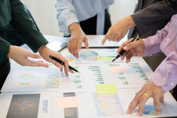 Business leaders talk about charts, financial graphs showing results are analyzing and calculating planning strategies, business success building processes