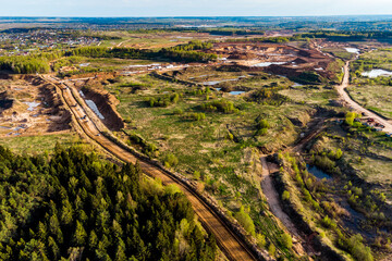 An aerial view of an area riddled with sand quarries. Maloyaroslavetsky district, Kaluga region