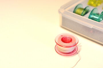 ミシンに必要なボビン。ケースに入っているボビン。