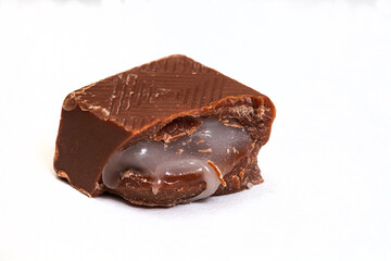 Single chocolate block filled with mint isolated on white with copy space.