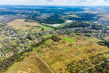 Aerial photo from a high altitude, view of the countryside stretching to the horizon