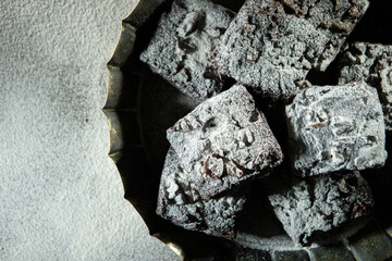 Chocolate brownies on a dark background	