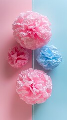 Tissue paper balls in a pink and blue colors. Gender reveal party concept. Creative background