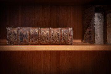 the old books in an bookcase
