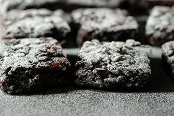 Chocolate brownies on a dark background