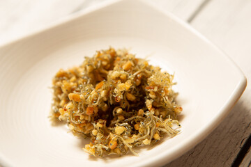 Stir-fried anchovies on a plate
