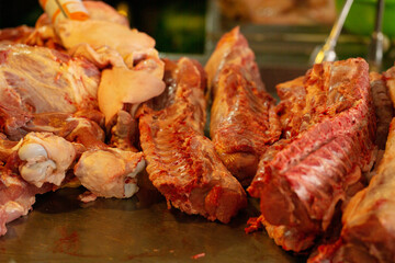 Fresh meat on display in a traditional market