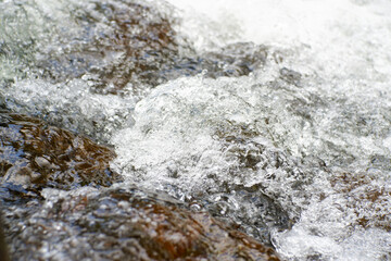 mountain river flows through the rocks