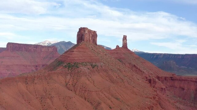 Large Natural rock formation, Parriot Mesa, in Utah desert, Moab. Aerial pull out shot