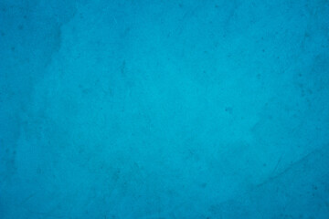 Dark blue concrete stone texture for background in wallpaper. Cement and sand wall of tone vintage minimal. 