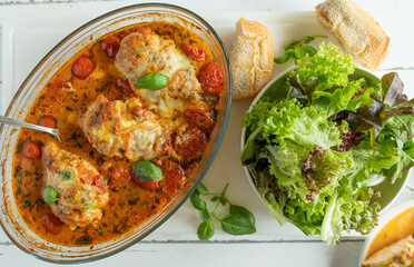 Baked chicken breast with mozzarella and delicious tomato sauce