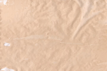 Old parchment paper sheet vintage pattern or  brown, crumpled, texture isolated on empty background.