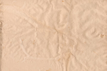 Old parchment paper sheet vintage pattern or  brown, crumpled, texture isolated on empty background.