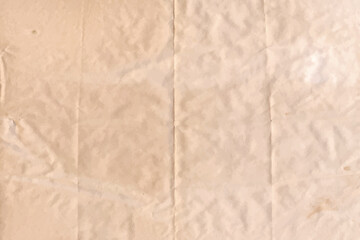 Old parchment paper sheet vintage pattern or  brown, crumpled, texture isolated on empty background.