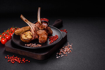 Delicious juicy meat on the bone or rack of lamb or grilled veal