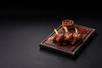 Delicious juicy meat on the bone or rack of lamb or grilled veal