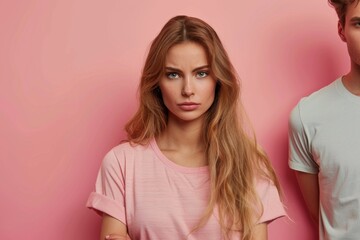 Obraz premium Pair: blonde lady, blue eyes, man pink shirt