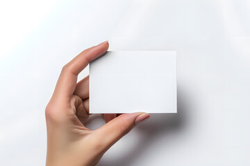  Business card mockup in woman's hand. Blank calling card template isolated on white background