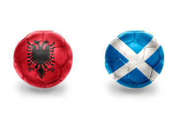 football balls with national flags of scotland and albania ,soccer teams. on the white background.