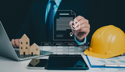 Architect or engineer Checking the list of documents and approving the project, Approved Buildings...